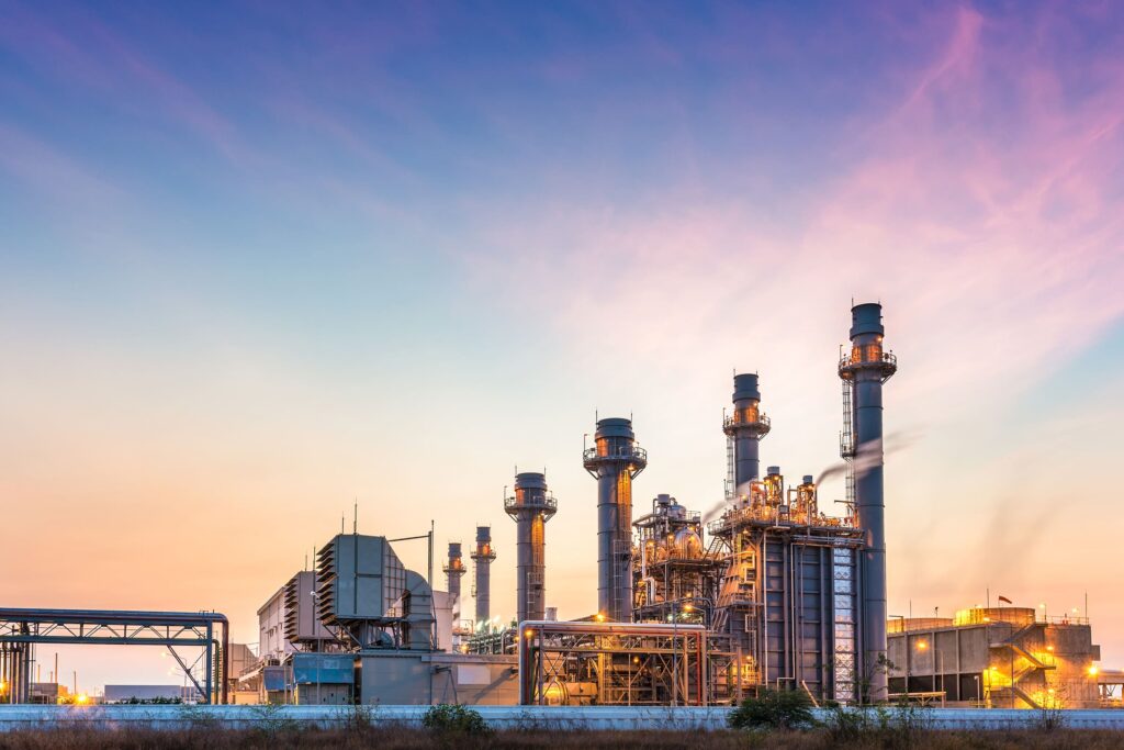 gas fired power plant at dawn with lights